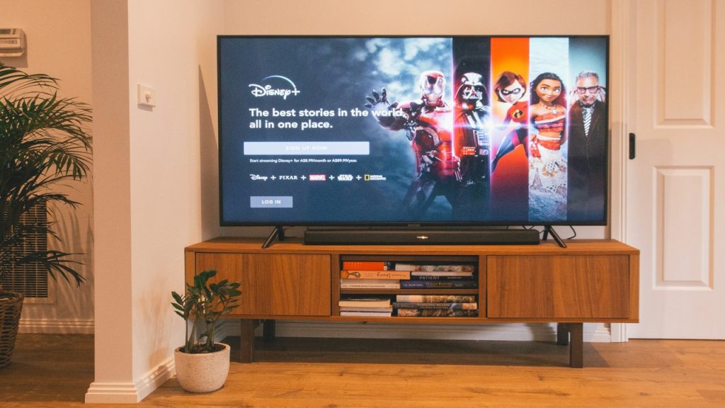 A TV displaying Disney + streaming app. 